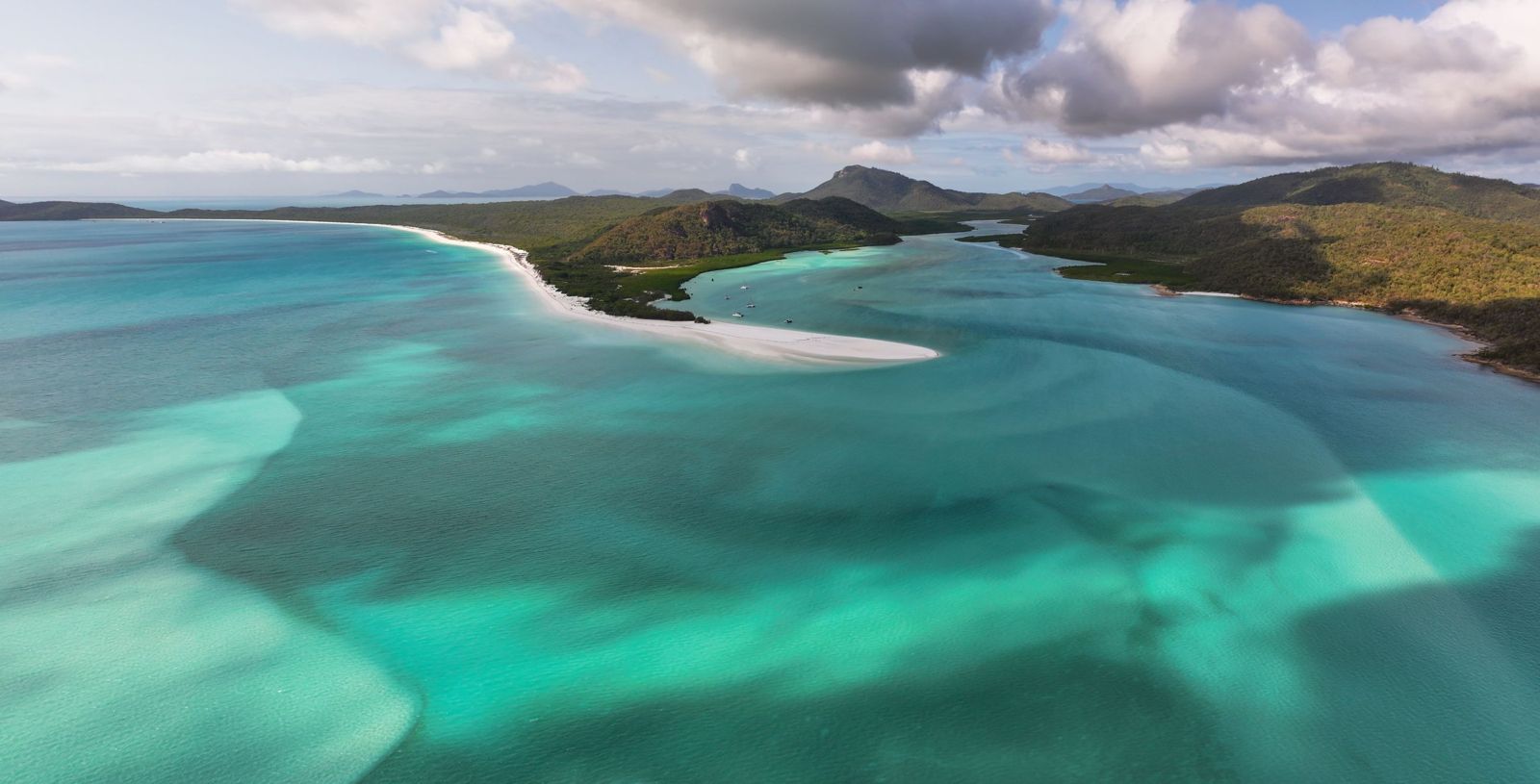 Swirling white sand and turquoise shallows at Hill Inlet on Whitsunday Island