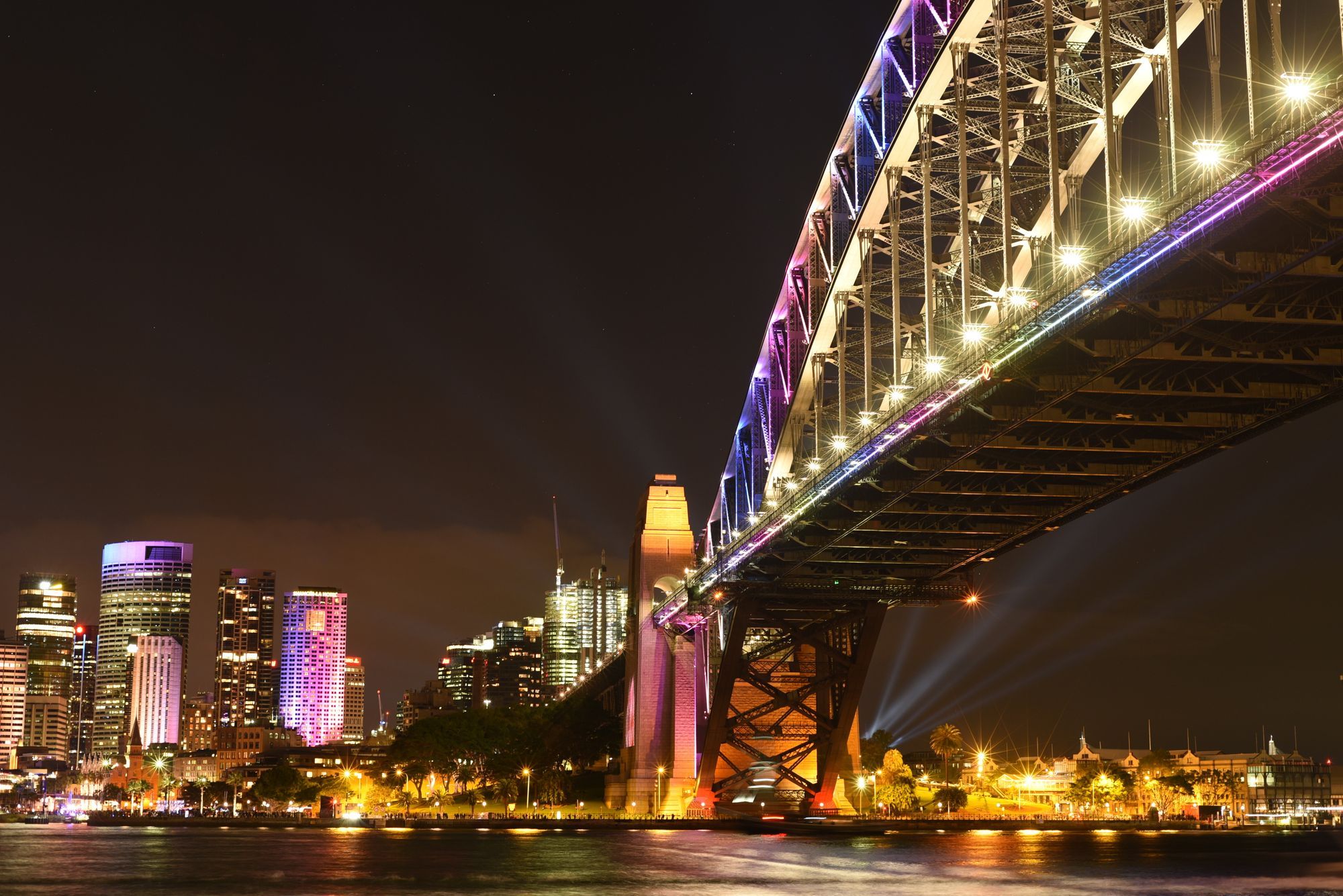 The Sydney Harbour Bridge and city lights at night