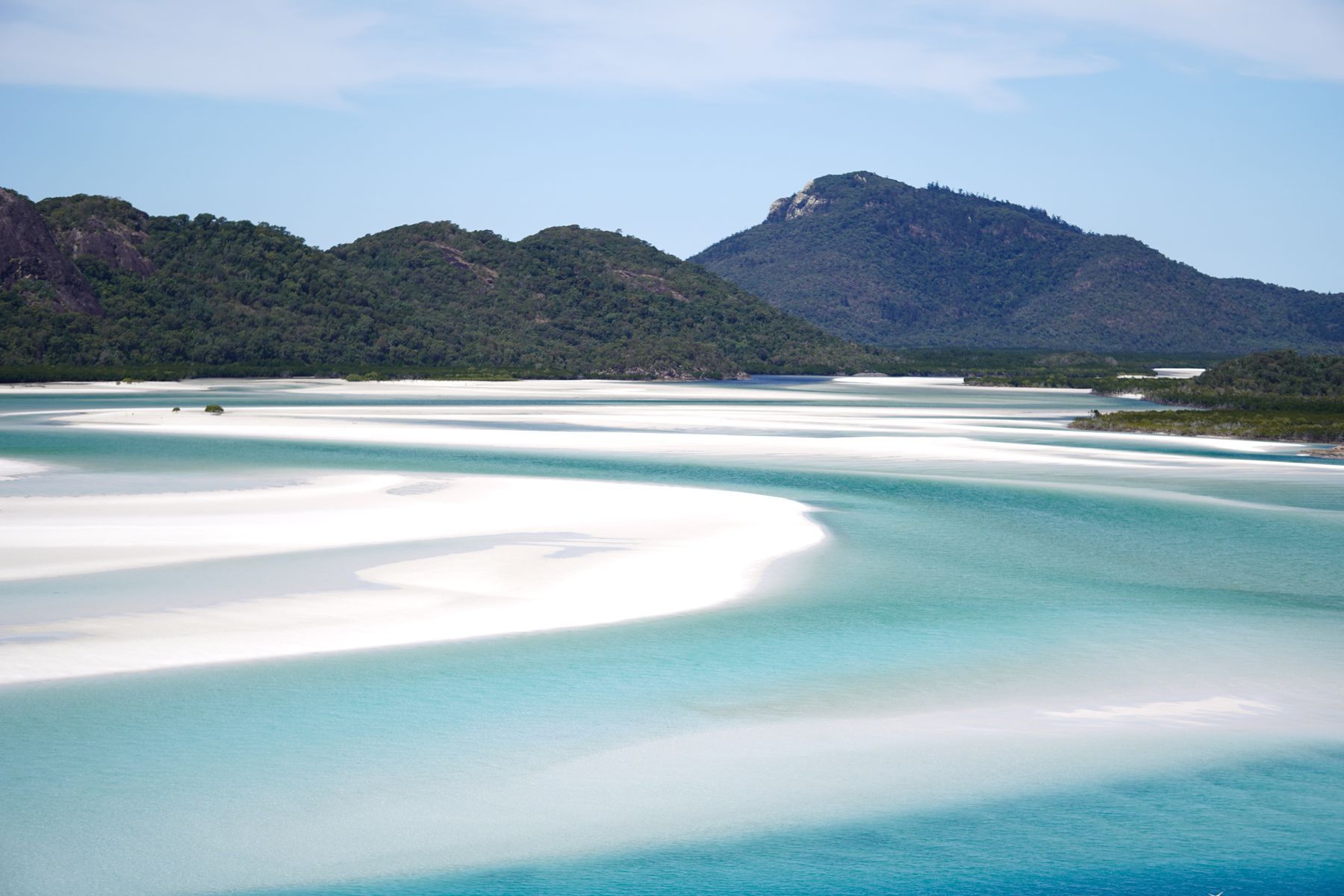 Swirling white sand and turquoise water at Whitehaven Beach from above