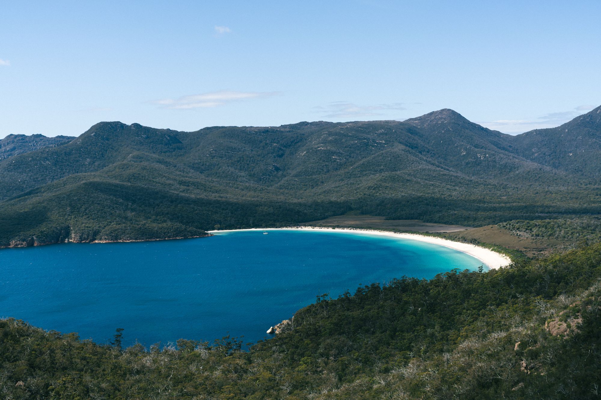 Wineglass Bay and the Freycinet mountains from above